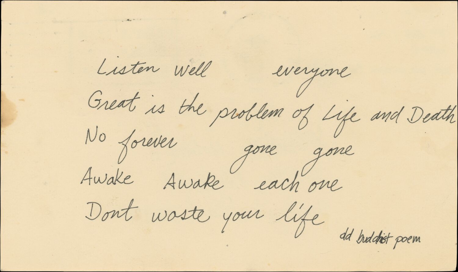 A yellowing postcard with a Buddhist poem handwritten by Steve. The last line reads: Dont waste your life.