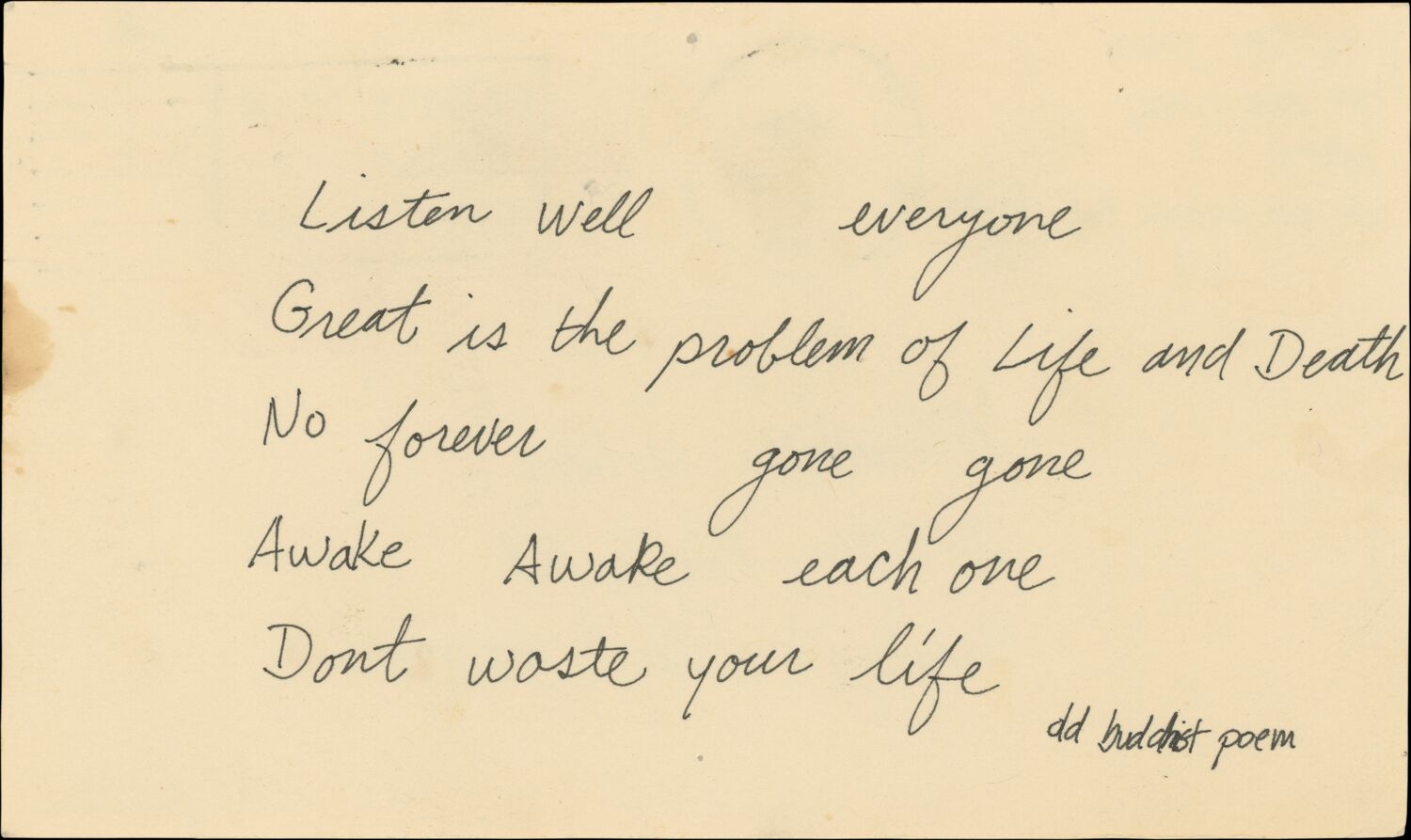 A yellowing postcard with a Buddhist poem handwritten by Steve. The last line reads: Dont waste your life.
