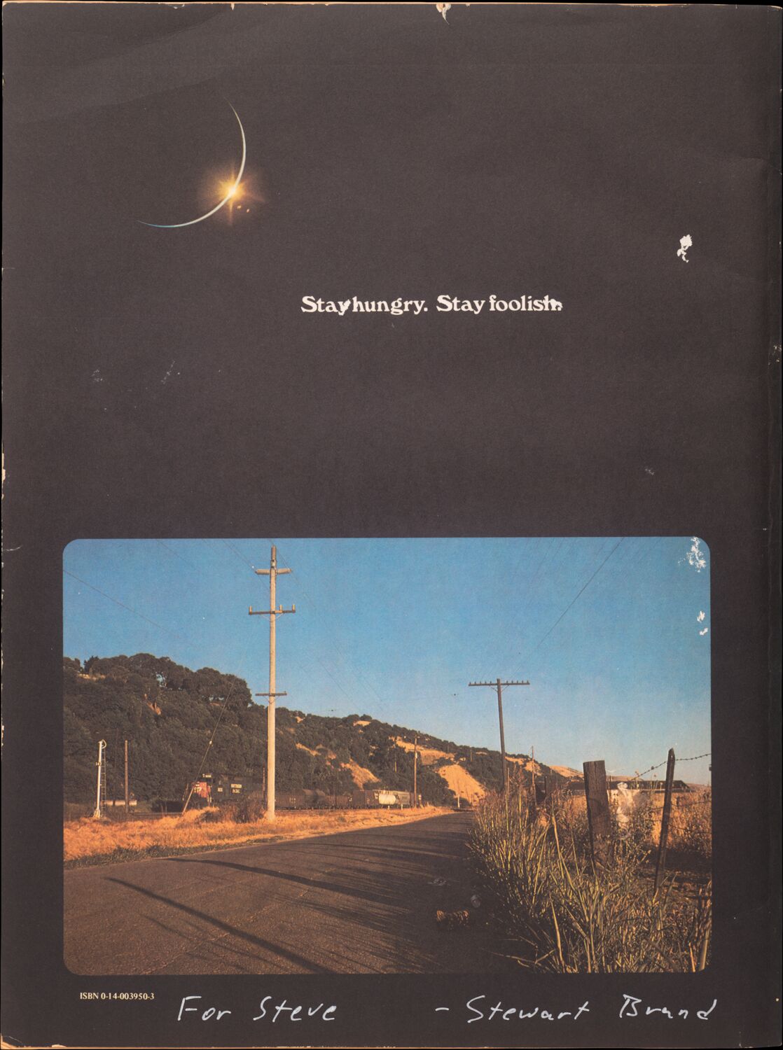 The back of the 1974 Whole Earth Epilog. A handwritten message in white ink reads: For Steve —Stewart Brand.